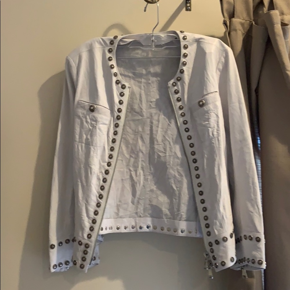 Beautifully detailed ivory leather jacket
